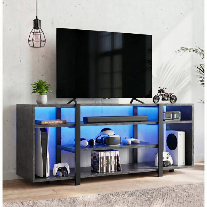 [Black Marble] LED TV Stand with Storage against a white brick wall with blue LED underlighting, open shelves holding a console