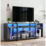 [Black Marble] LED TV Stand with Storage against a white brick wall with blue LED underlighting, open shelves holding a console