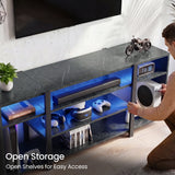[Black Marble] Zelumi TV stand showing open shelf storage with blue LED lighting and person placing gaming console into side compartment