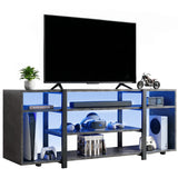 [Black Marble] Zelumi TV stand on white background with TV placed on top, blue LED shelves loaded with gaming consoles, VR gear and game cases