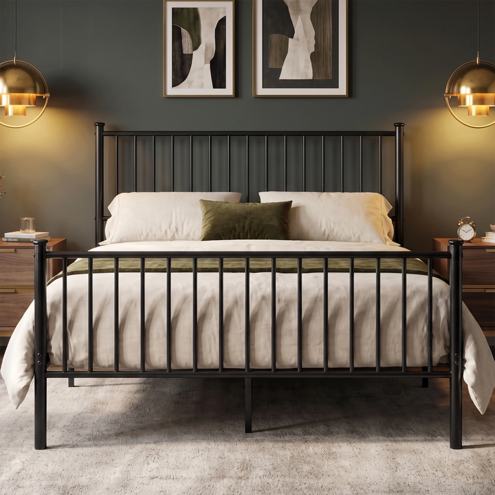 [Black | King] front view showing the bar headboard and footboard, centre leg, cream bedding, and twin pendant lights.