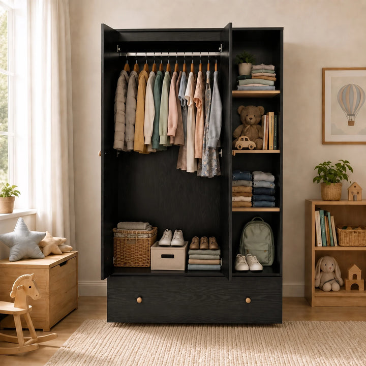[Black] Wardrobe with doors open showing hanging rail, clothes, inner shelves, drawer, storage boxes, books, and toys.