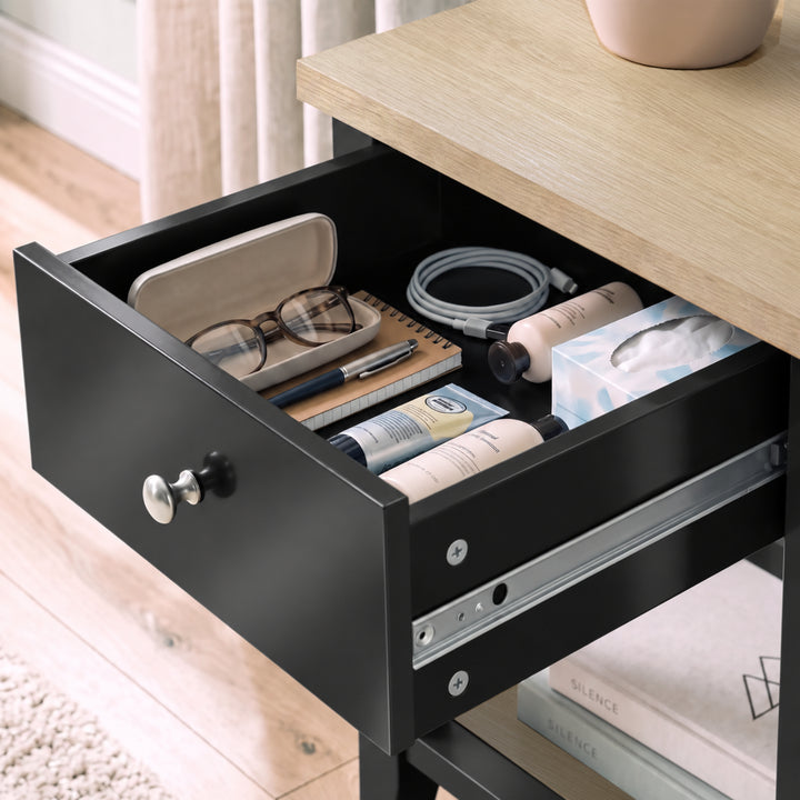 [Black] Open drawer detail of Black Shaker Bedside Table showing internal storage capacity.
