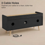 [Black] Larvik TV unit rear panel view with three circular cable holes and a black power cord through centre