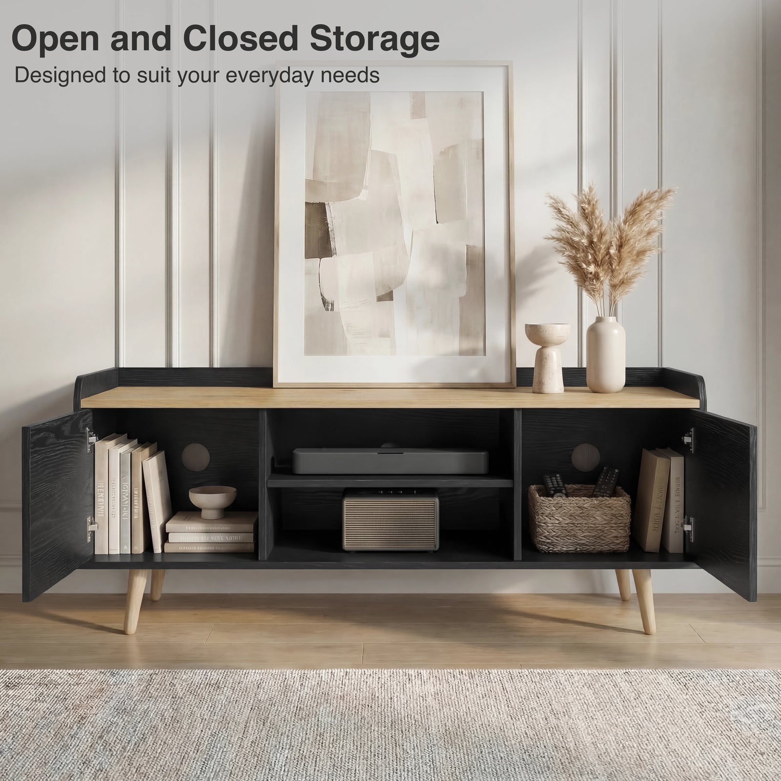 [Black] Larvik TV unit with both side doors open showing books on left, soundbar centre and woven basket right