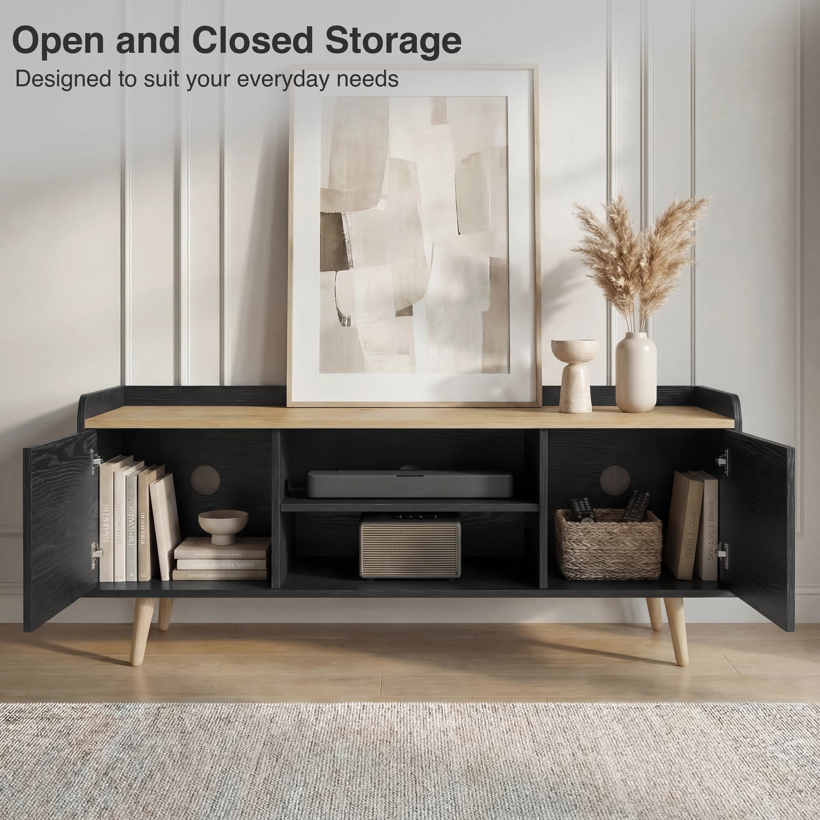 [Black] Larvik TV unit with both side doors open showing books on left, soundbar centre and woven basket right