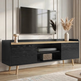 [Black] Larvik TV unit in lifestyle scene with pampas vase, books and basket inside centre cubby of low cabinet
