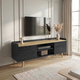 [Black] Larvik TV unit wide living room placement with TV above, cream rug below and pampas vase on right