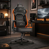[Black + Orange] gaming chair with the Xstriker logo on the headrest, backrest, and lumbar support, positioned in a modern, dimly lit home office setup.