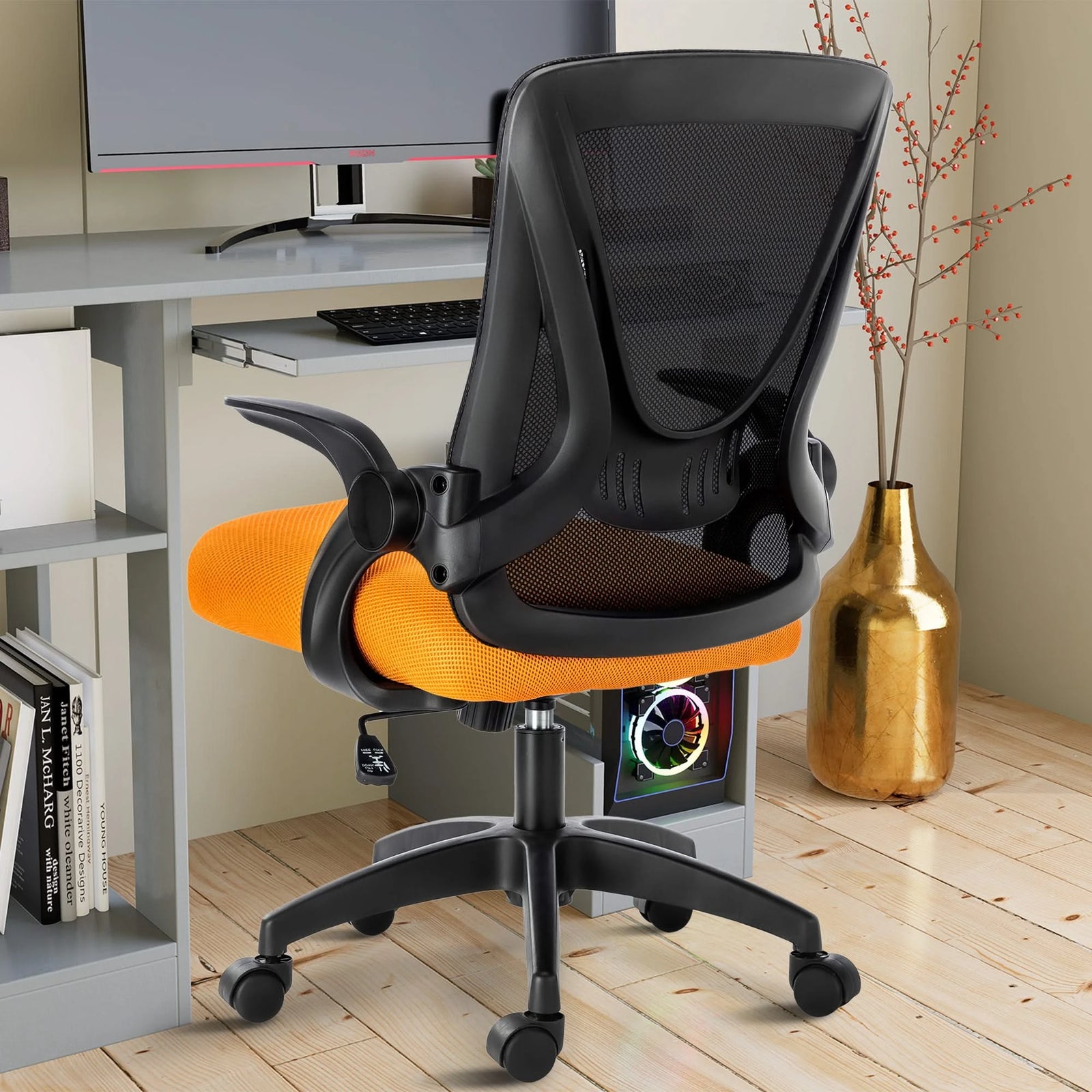 [Black + Orange] Back view of a small office chair featuring a breathable mesh backrest, designed for ergonomic use at your workstation.