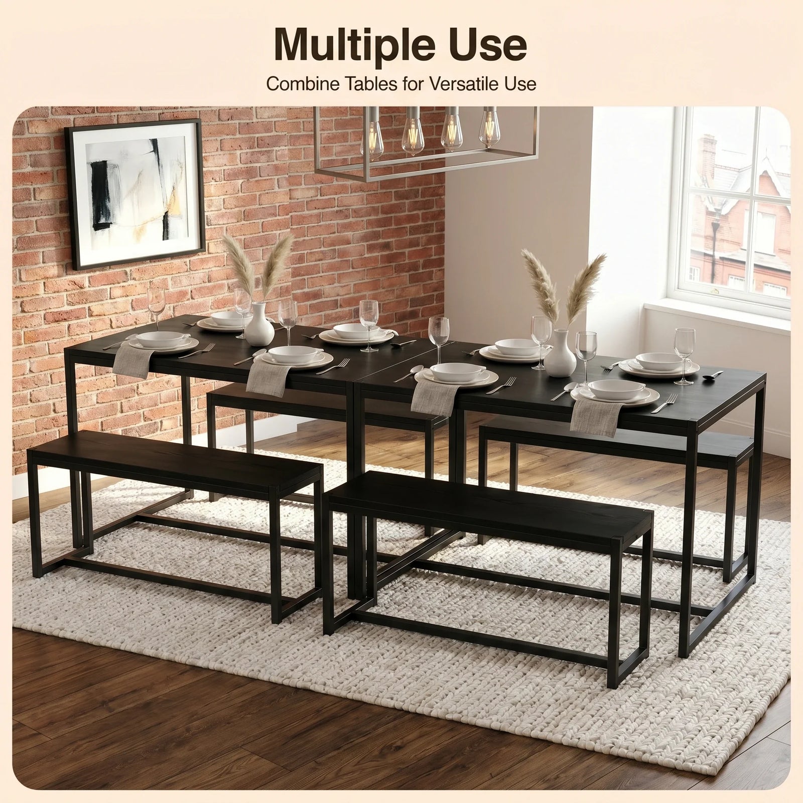 [Black] Orvak dining table with two bench sets joined together to seat eight in an industrial dining room with place settings and pampas centrepieces