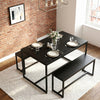 [Black] Orvak dining table viewed from above with two benches, set for four with place settings, glassware, and a white rose centrepiece