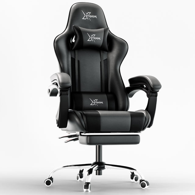 Xstriker Gaming Chair With Footrest in black PU leather featuring ergonomic lumbar support, reclining backrest, and padded armrests for home or office use. Ideal for gamers and professionals seeking comfort and style in a PC desk chair.