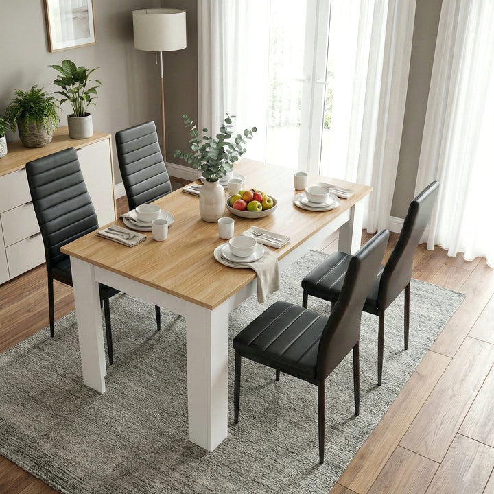 [4 Seater | Black] Dining Table and Chairs Set viewed from above in a styled dining room with four black chairs, place settings, and a fruit bowl centrepiece