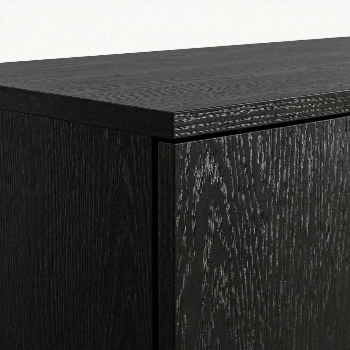 [Black]  Top corner panel detail of black rustic wardrobe highlighting wood grain texture and edge finish