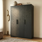 [Black]  three door wardrobe positioned in bedroom setting with neutral wall and floor decor