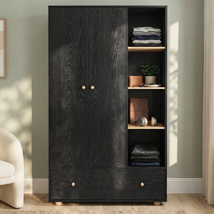 [Black] Selby wardrobe front view with two-door panel, open shelves with folded clothes and accessories, and bottom drawer