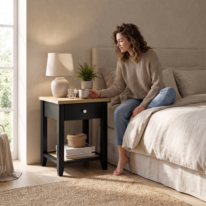 [Black] Lifestyle view of Black Shaker Bedside Table placed next to a modern upholstered bed.
