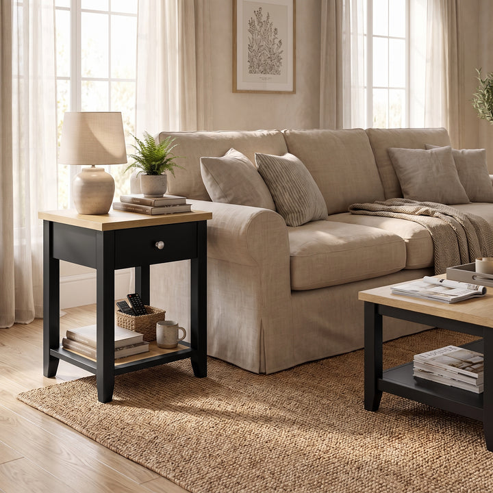[Black] Black Shaker Bedside Table styled as a living room end table beside a modern sofa.