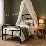 [Black | Single] Bedroom scene showing curved rails, canopy fairy lights, star and cloud cushions, rabbits, and woven rug.