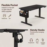 Black Electric Standing Desk with flexible storage pocket and handy hooks. Ideal for organizing headphones, pens, and office supplies.