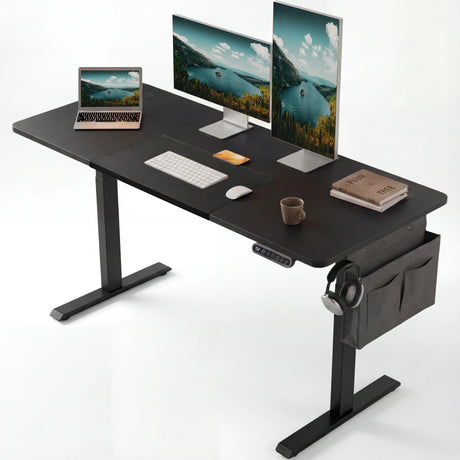 Spacious Black Electric Standing Desk setup with dual monitors, laptop, and accessories, ideal for gaming or productivity-focused workspaces.