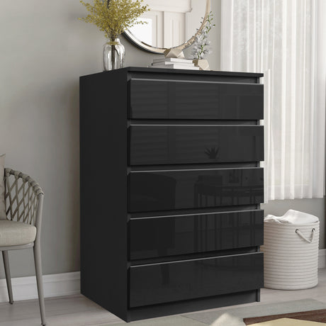 Black tall chest of drawers, providing vertical storage with a sleek and contemporary design.