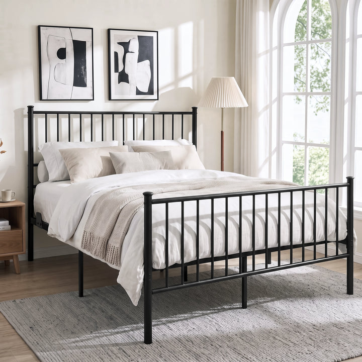 [Black | Double] Angled black metal bed view with cream bedding, tall bar headboard, matching footboard & centre support legs