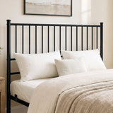 [Black | King] Metal bed close-up view of tall vertical-bar headboard with white pillows & black-and-white abstract wall art.