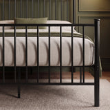 [Black | Double] Close-up shot of footboard and vertical metal bars on double bed frame