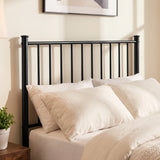 [Black | Single] Metal bed close-up of tall bar headboard with cream-white pillows, wooden bedside table, plant and wall art.
