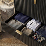 Black flutrina wardrobe drawer interior view with clothing organisation and storage capacity