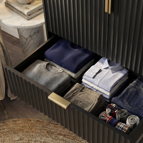 Black flutrina wardrobe drawer interior view with clothing organisation and storage capacity