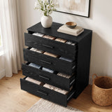 [Black] Angled view of a black wood grain chest of drawers with all four drawers pulled open showing stored clothing items