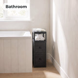 [Wooden Dark Grey] Narrow side table with storage beside a bath, holding towels and toiletries
