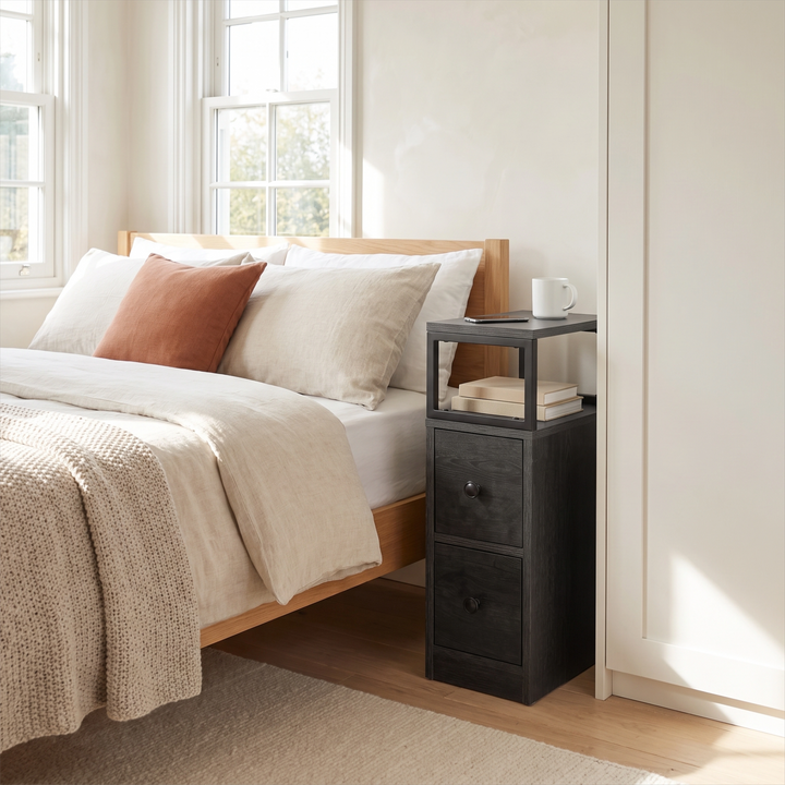 [Wooden Dark Grey] Narrow side table with storage beside a bed, holding a lamp and small bedroom essentials