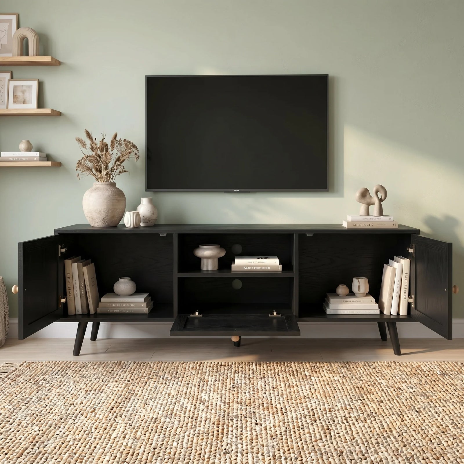 [Black] Wovena Black Rattan TV Unit with 2 Door Storage front view with both doors open revealing interior shelves, books and pulled-out central rattan drawer