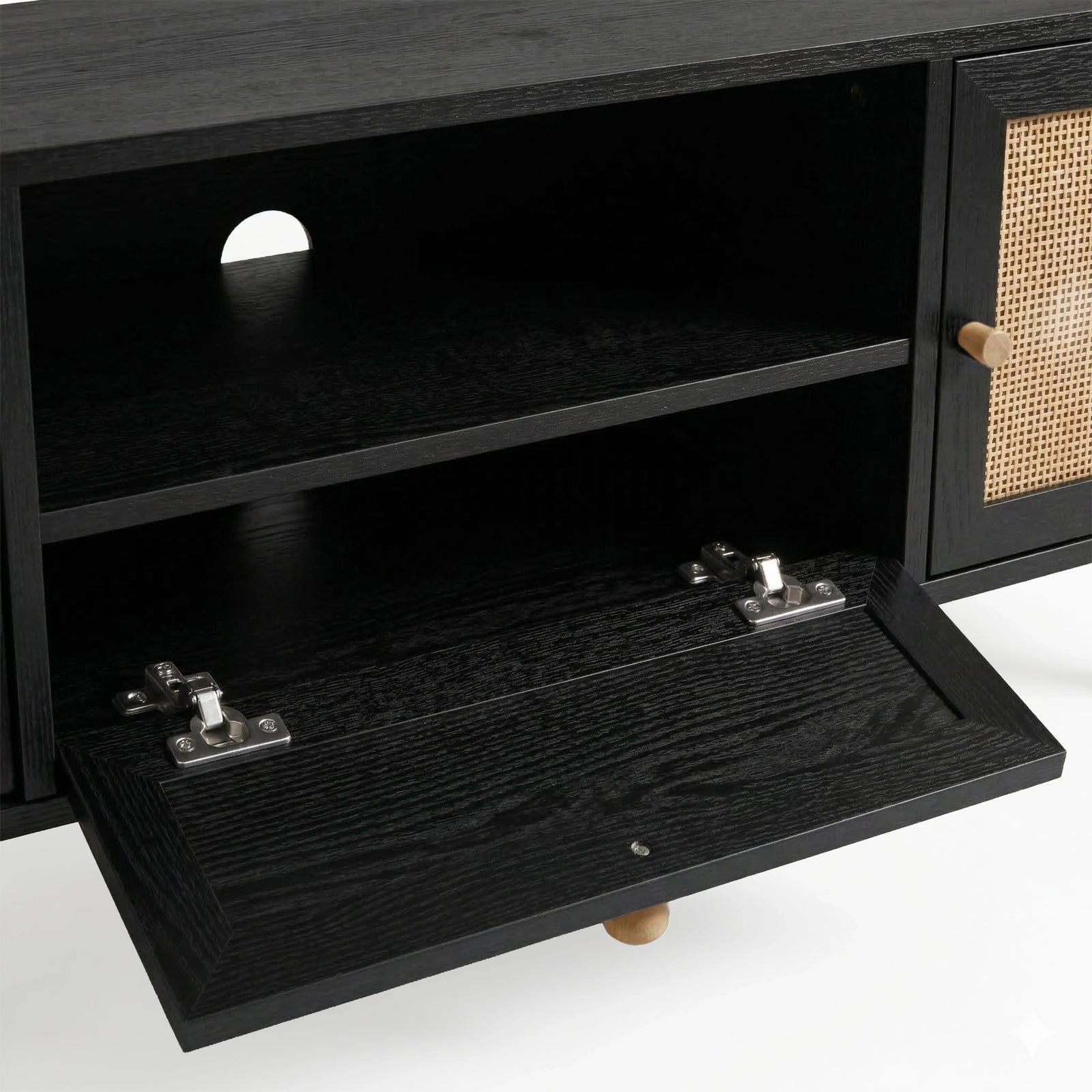 [Black] Close shot of Wovena rattan TV unit drop-down compartment, hinge hardware and back-panel cable routing hole