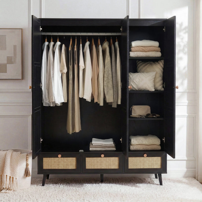 [Black] Wovena wardrobe open interior showing hanging rail with clothes, four shelves with folded items, and rattan drawers