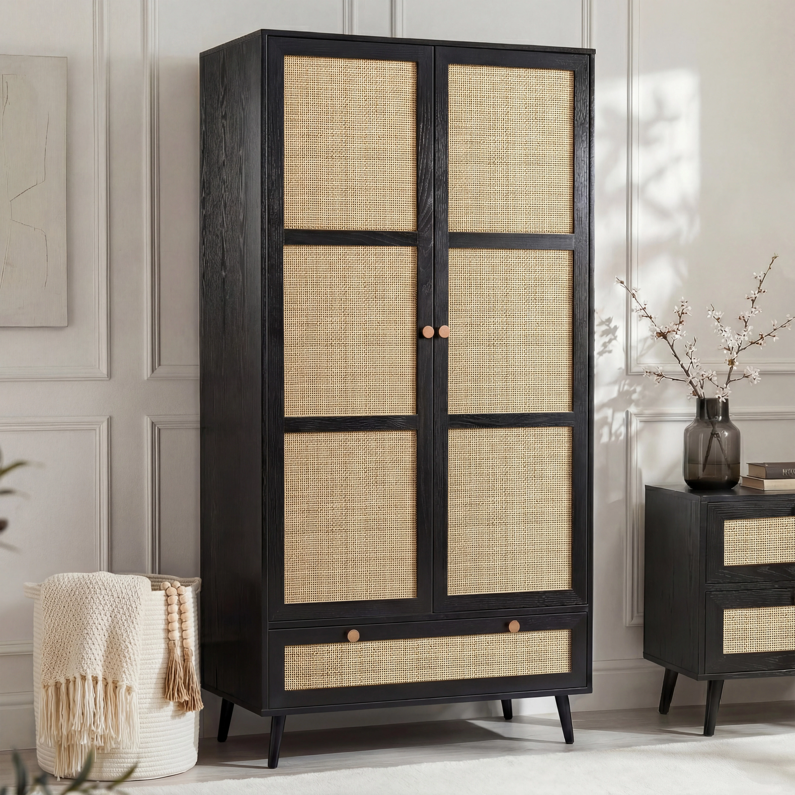[Black] Wovena rattan wardrobe with both doors open showing hanging rail of clothes and pull-out base drawer