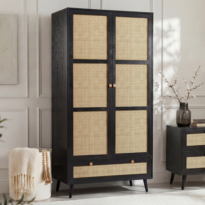 [Black] Wovena rattan wardrobe with both doors open showing hanging rail of clothes and pull-out base drawer