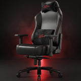 [Black] Xstriker High-Back Ergonomic Gaming Chair with Lumbar Support studio view with a subtle red glowing background.
