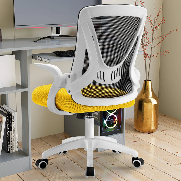 [Black + Yellow] Black and yellow comfy desk chair with breathable mesh backrest, perfect for use at a workstation.