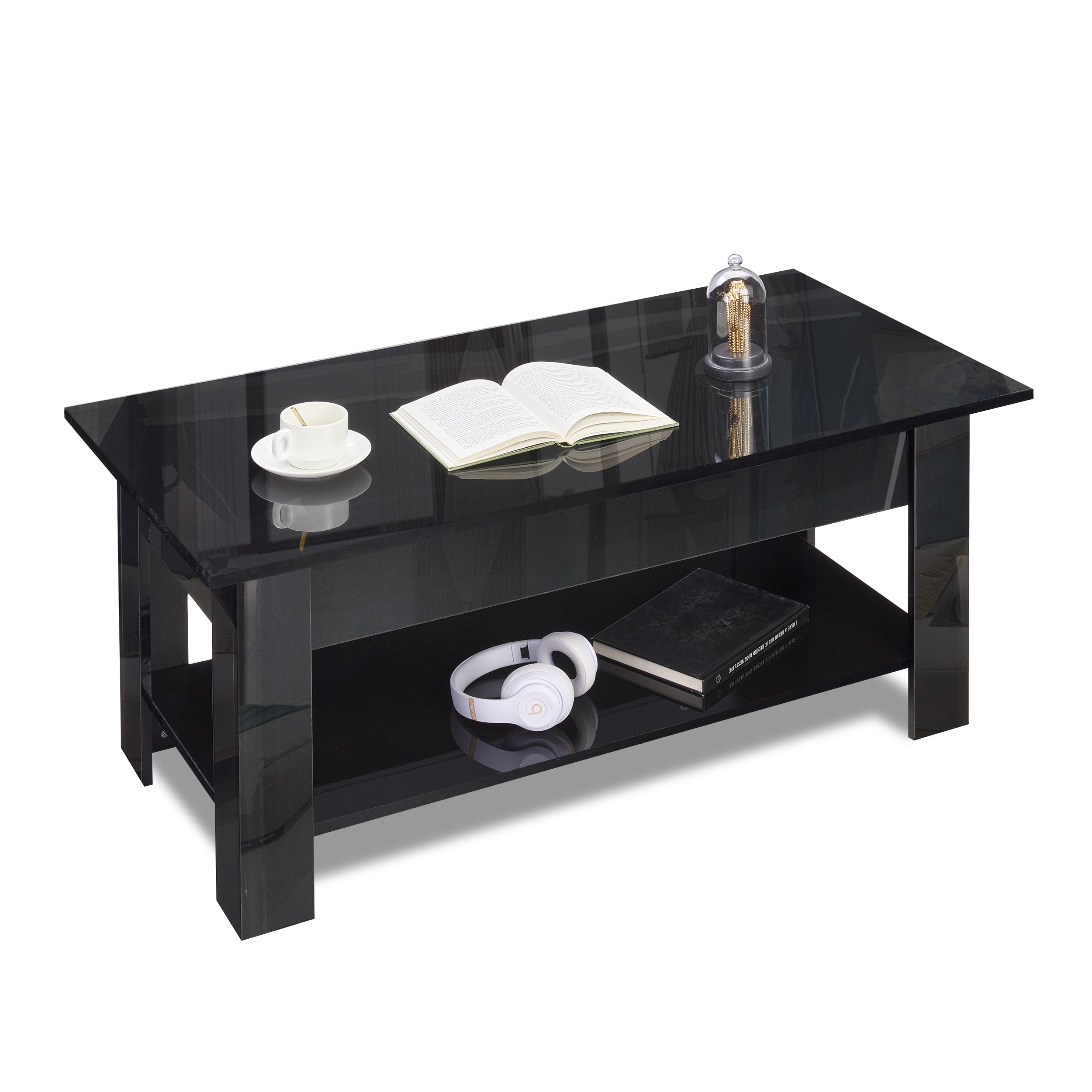 Black coffee table with gloss top, open lower shelf, and decorative items including and books