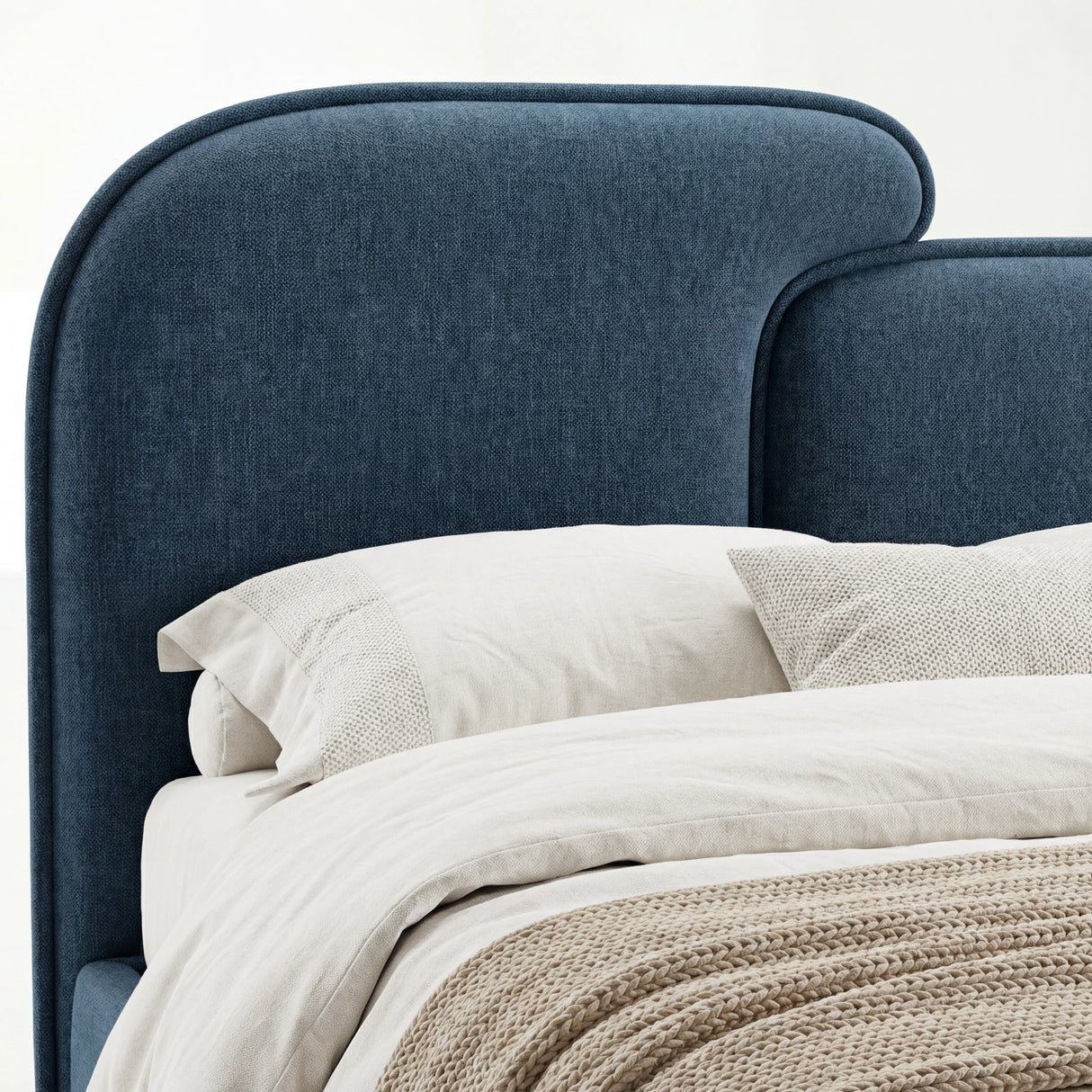 [Double | Blue] Close view of blue upholstered split headboard surface showing fabric weave and softly curved outline