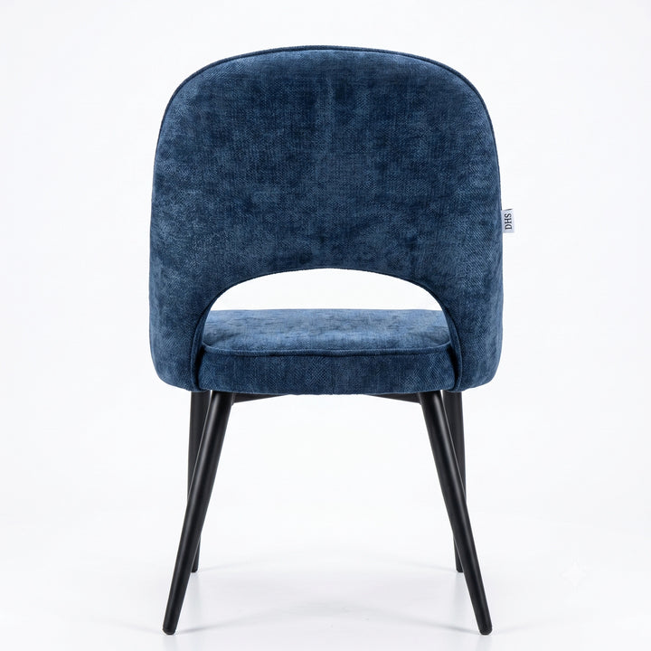 [Blue | Set of 2] Rear view of the comfy fabric dining chair with rounded open back, piped seat and four black metal legs.