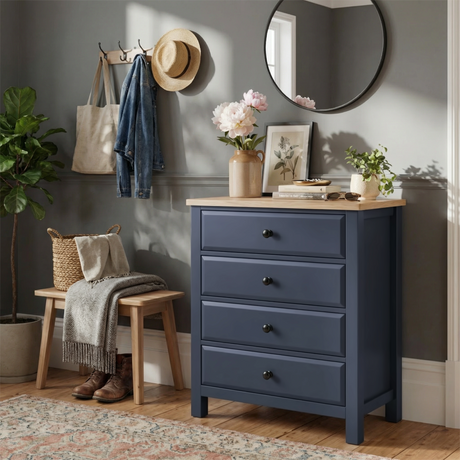 [Blue] Haven 4 drawer chest in a styled hallway with round mirror, wall hooks, wicker basket and large indoor plant
