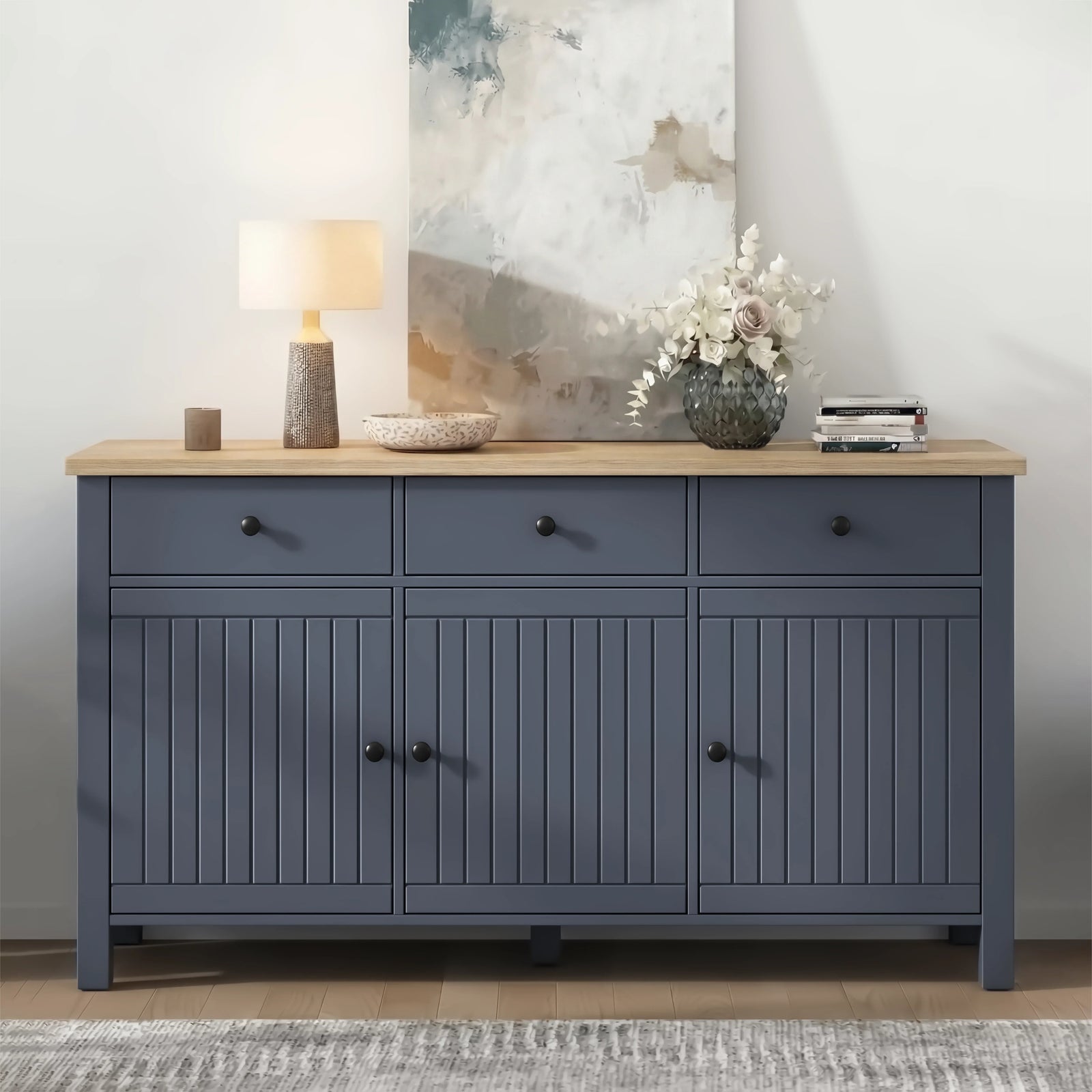 [Blue] sideboard with wooden top in a room setting with decor items