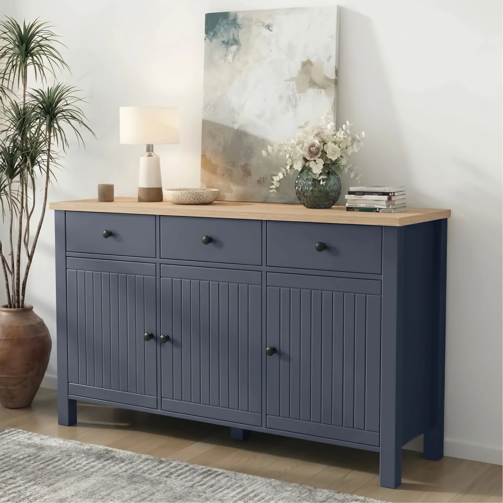 [Blue] 3 door sideboard with wooden top in a room setting with decor items