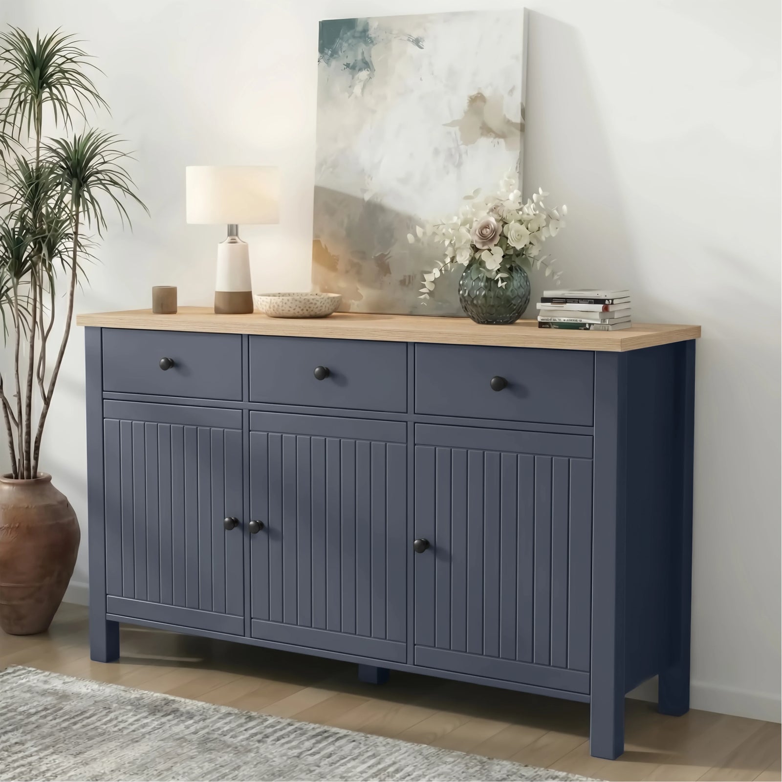 [Blue] 3 door sideboard with wooden top in a room setting with decor items